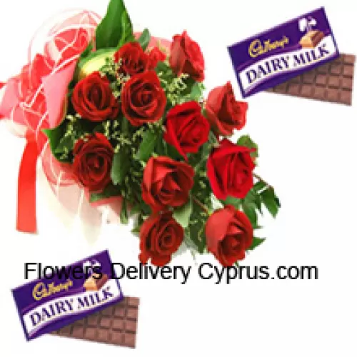 Bunch Of 12 Red Roses With Seasonal Fillers Along With Assorted Cadbury Chocolates