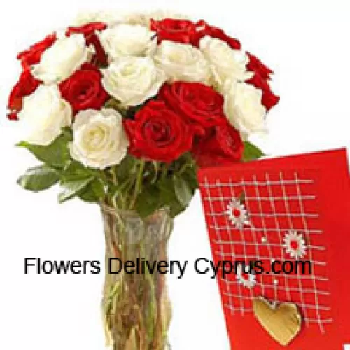 12 Red And 12 White Roses In A Glass Vase Accompanied With A Free Greeting Card