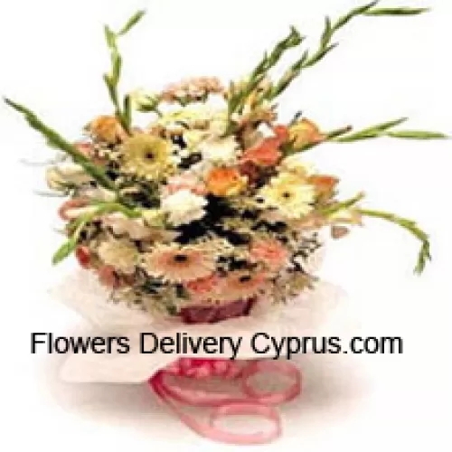 Bouquet de fleurs assorties comprenant des marguerites et des glaïeuls