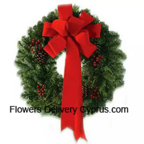 This stylish wreath with an extravagant red silk ribbon is made so your dear ones can celebrate Christmas with style (Please Note That We Reserve The Right To Substitute Any Product With A Suitable Product Of Equal Value In Case Of Non-Availability Of A Certain Product)